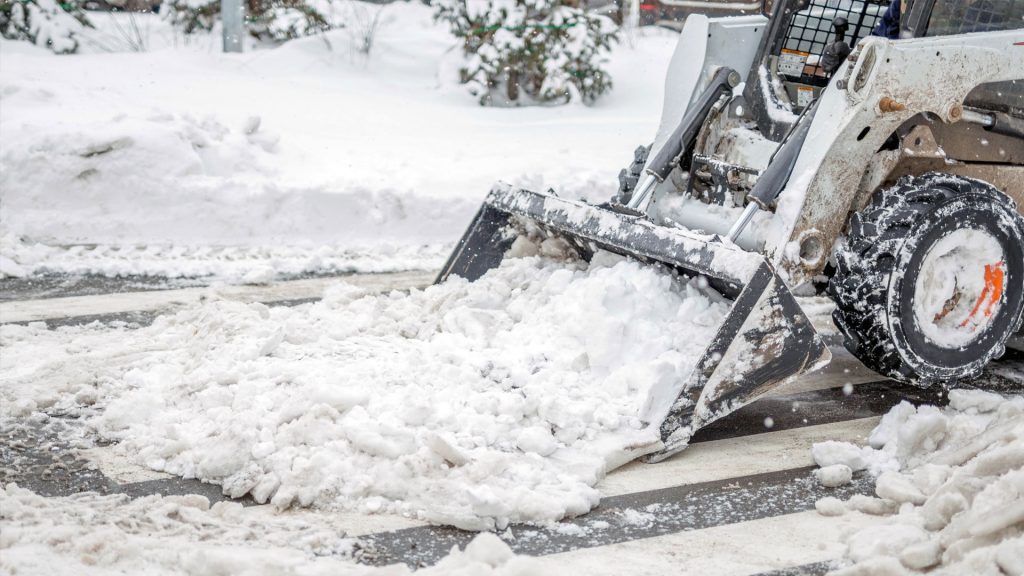 Skidsteer clearing snow